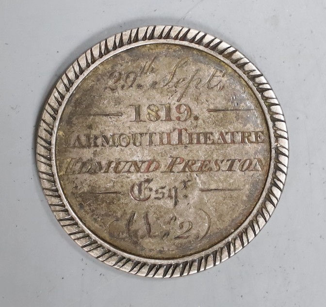 A late George III silver theatre ticket inscribed 'Proprietors Transferable Ticket', verso '29th Sept. 1819 Yarmouth Theatre Edmund Prescott Esq, No.2' diameter 39mm.